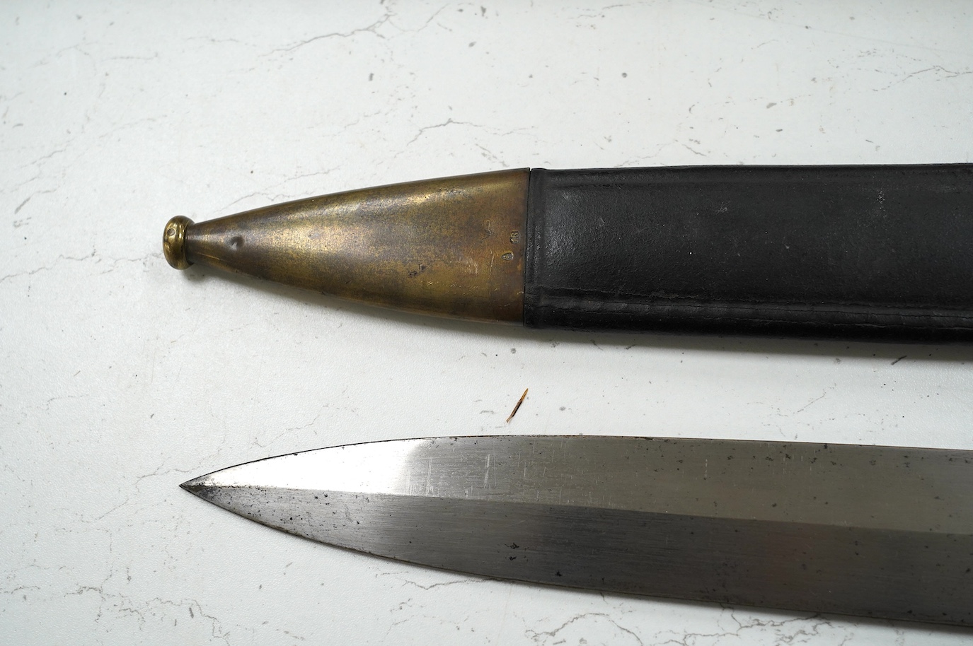 A French Gladius, regulation blade stamped ‘Chatellerault 1833’ in its scabbard, blade 48.5cm. Condition - good